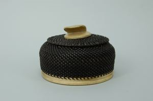 Image of baleen basket with fossil whale bone base and whale fluke finial